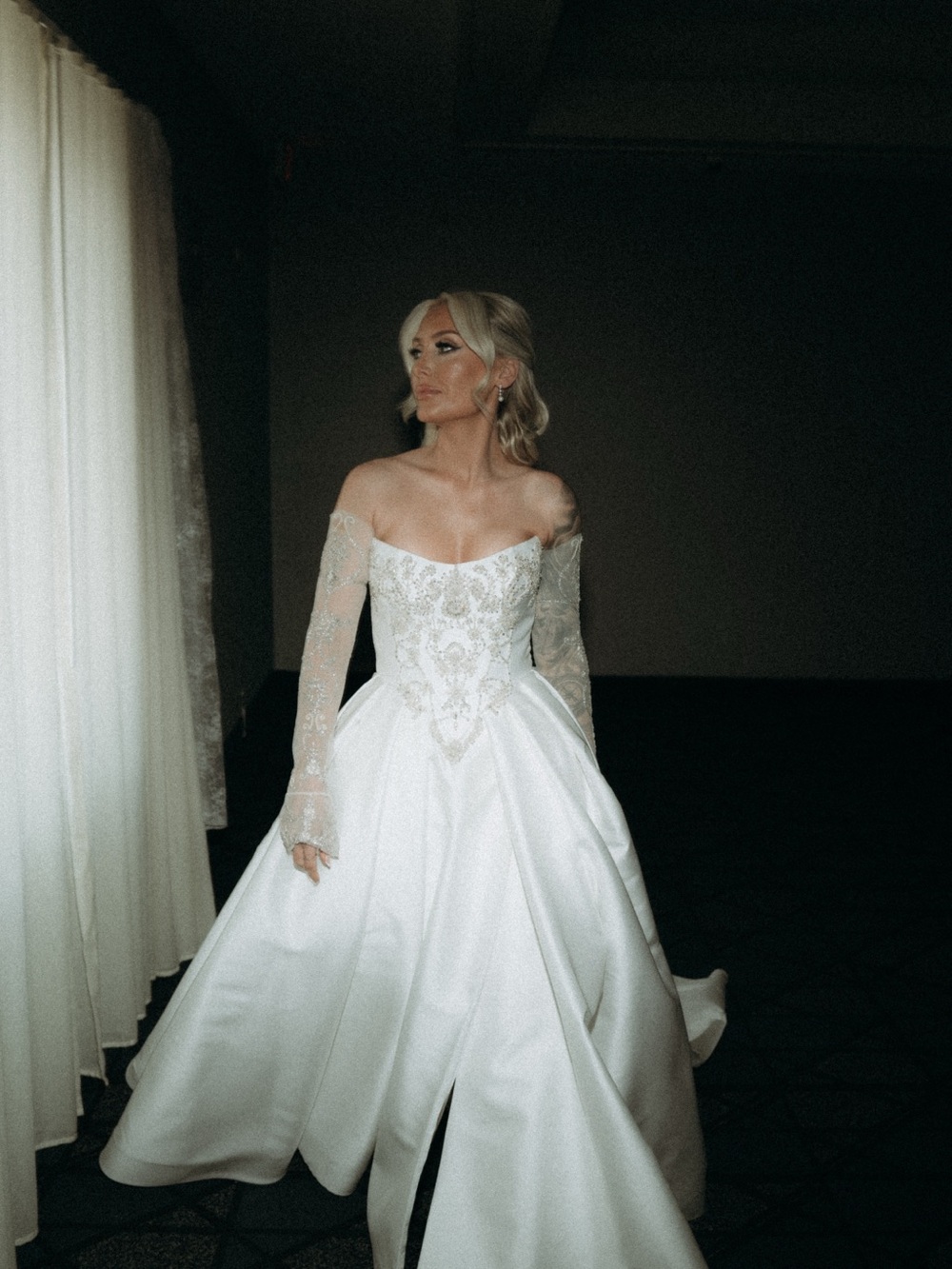 Off-the-Shoulder White Bridal Ball Gown with Beaded Bodice